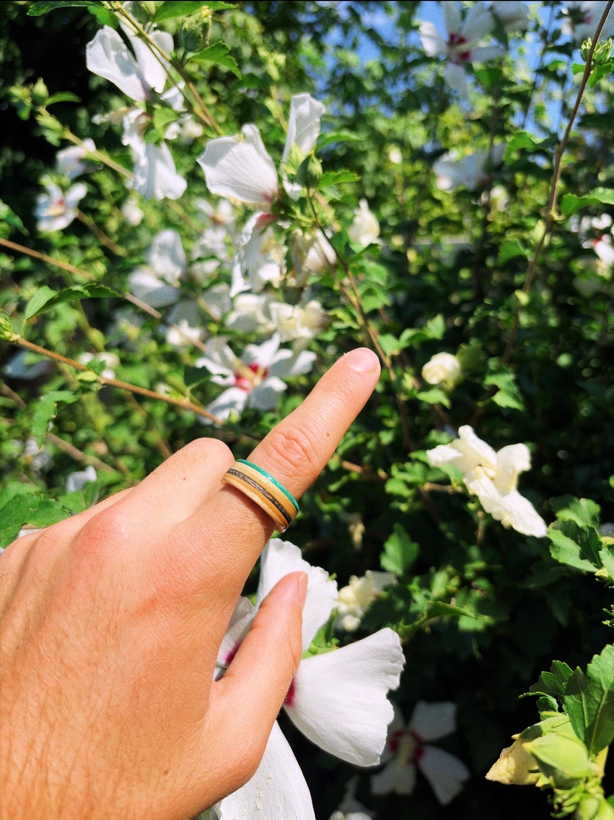 Timpooneke Recycled Skateboard Ring on finger