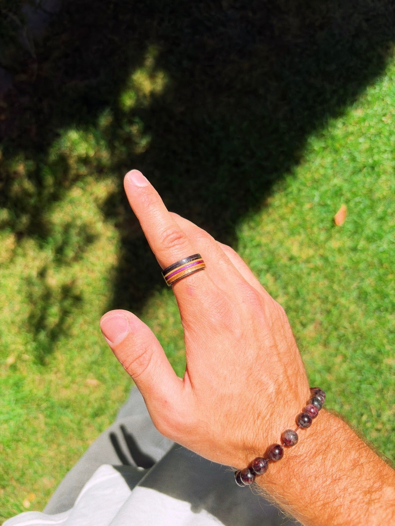 Midnight Bloom Recycled Skateboard Ring on finger