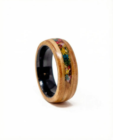 Floral Bloom wedding band with recycled skateboard maple, dried flowers, and clear epoxy