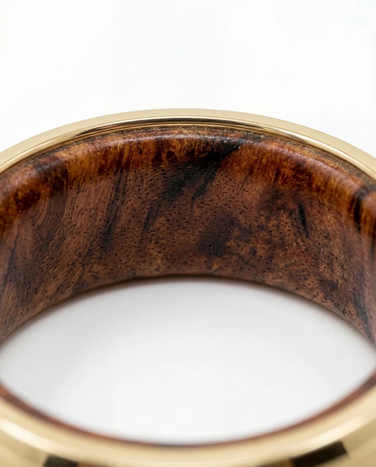 Close up of The Haven Red Amboyna Burl wood interior